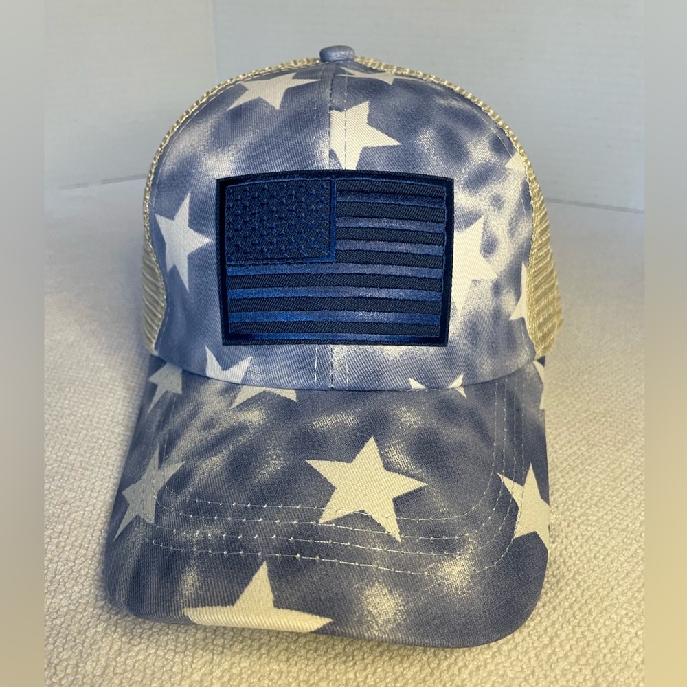 Women’s Ball Cap. Has Blue Flag Patch And Star Print. NWOT